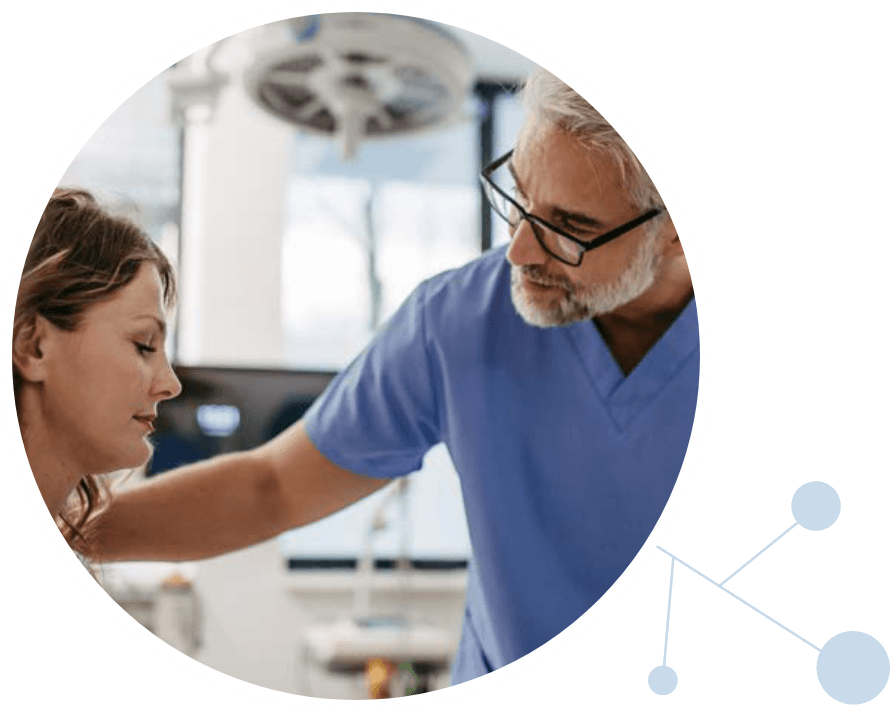 A physician reassuring a patient