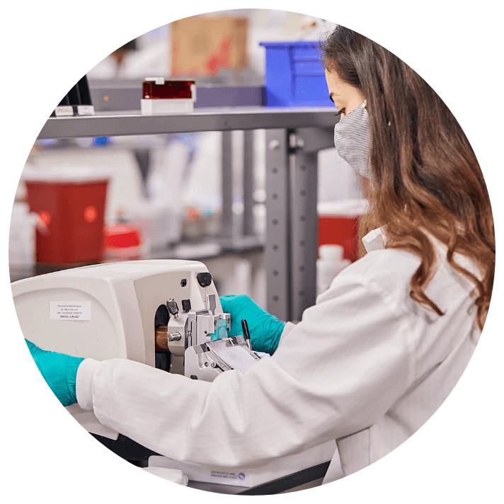 A female lab employee processing samples in a lab