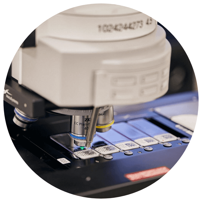a microscope performing cytogenetics lab services