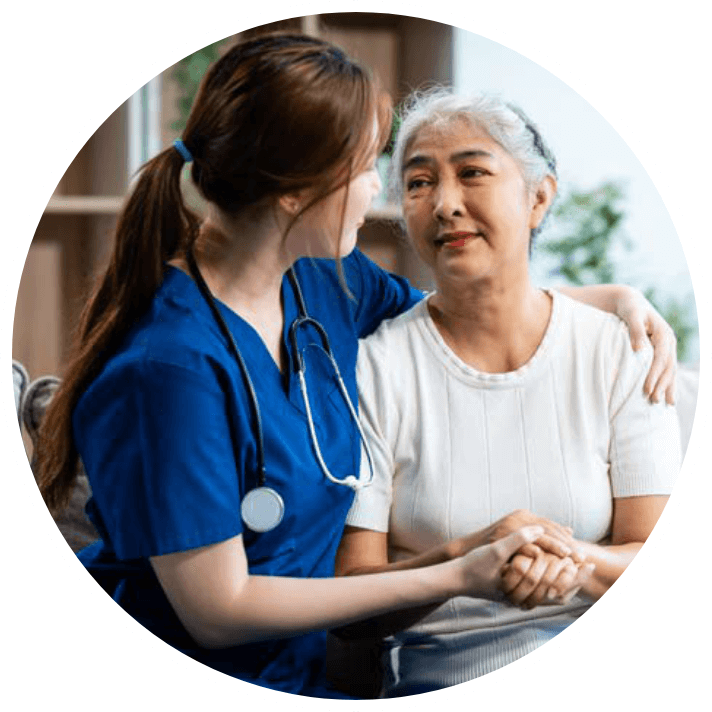 A nurse reassuring a patient